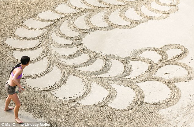 'I get a bit of a sweat on ... after an hour or so my back gets sore. I'm also using my core strength on the hard wet sand,' she said